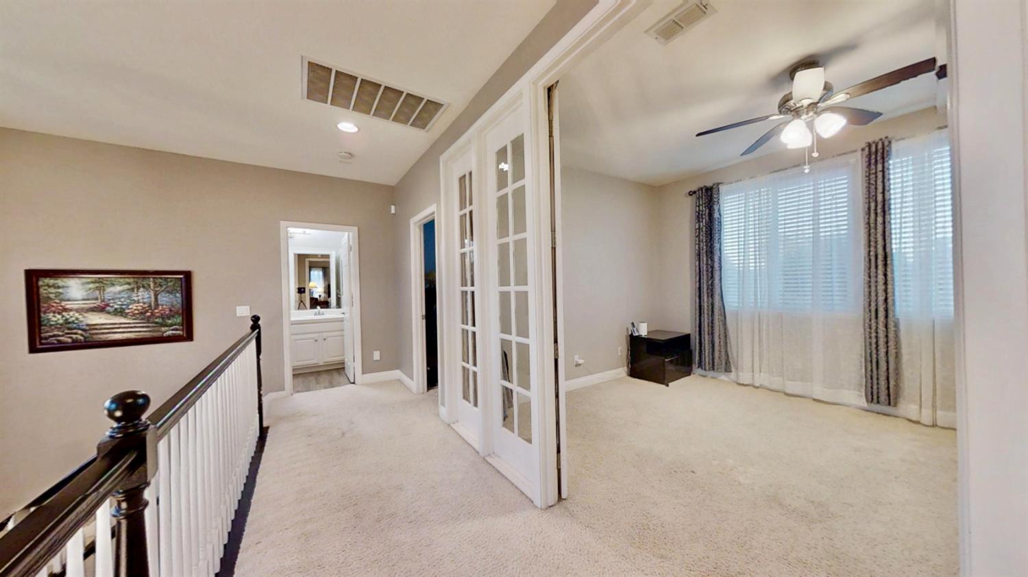 9573 Spring River Way Elk Grove, CA 95624 - Photo 33 of 53 a view of a hallway with interior of the house