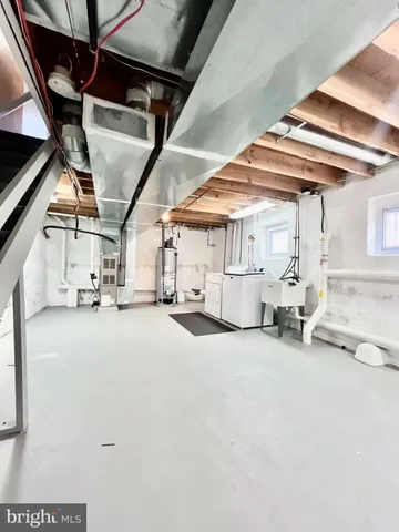 a view of a room with wooden walls