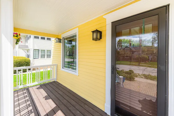 a view of a porch with a door