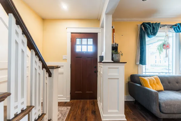 a living room with furniture and a window