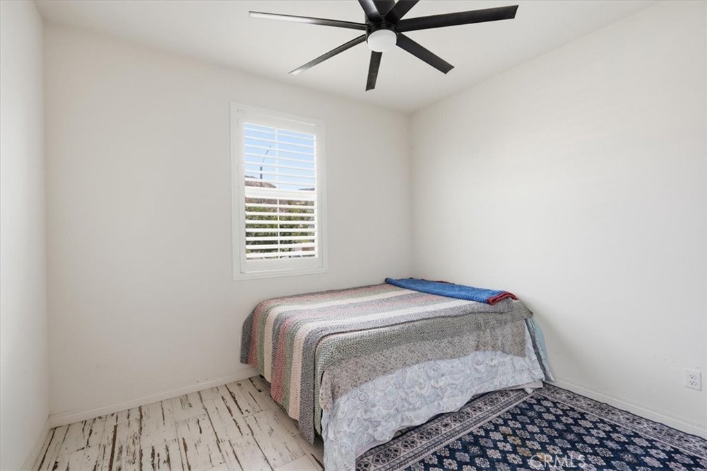 32350 Iron Trail Road Winchester, CA 92596 - Photo 22 of 32 a bedroom with a bed and window