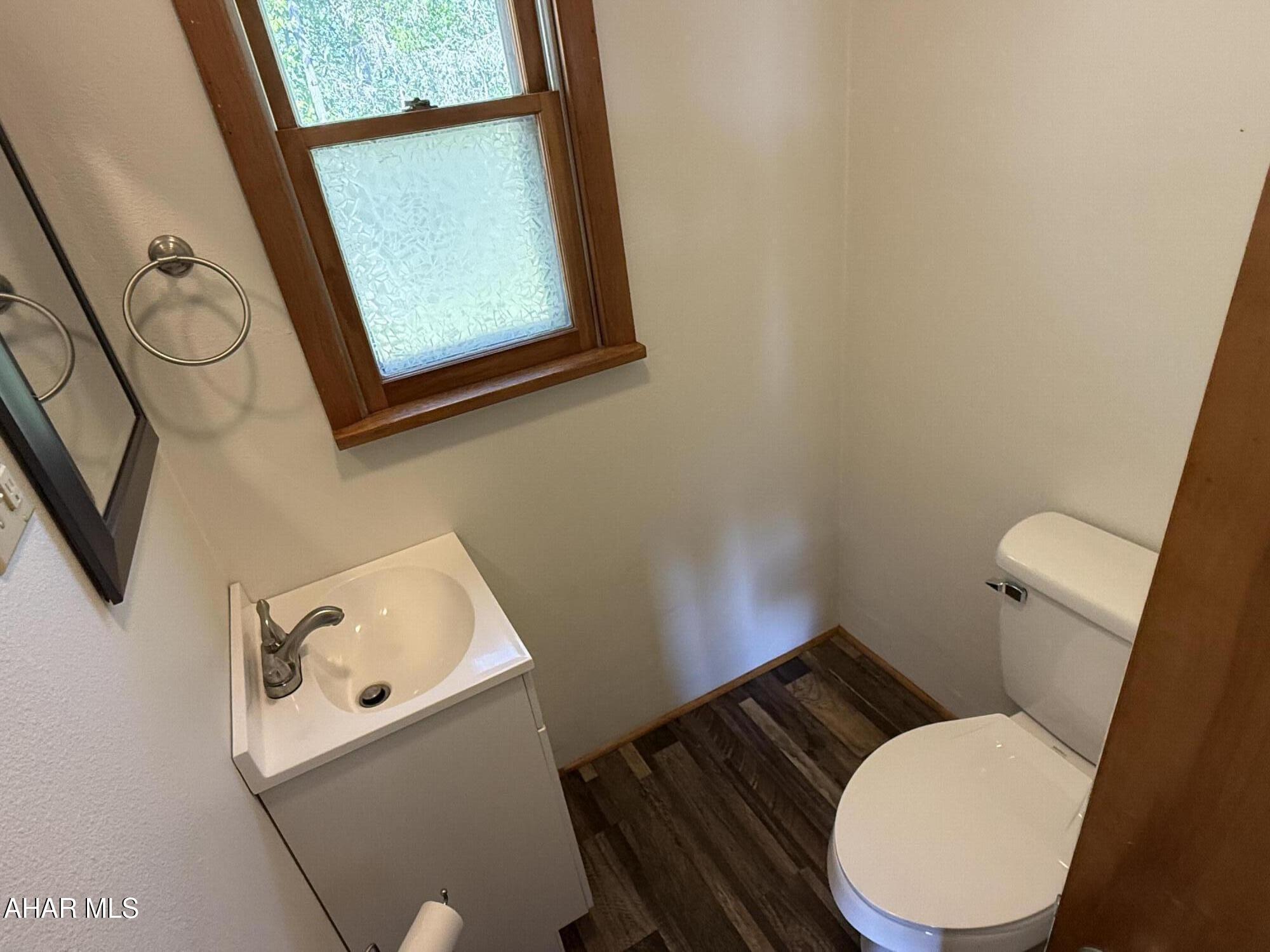473 Calhoun Road Everett, PA 15537 - Photo 25 of 45 a white toilet sitting next to a bathroom sink