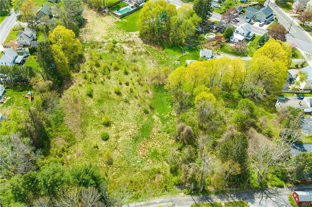 6 Broad Street Killingly, CT 06239 - Photo 11 of 13 a view of a big yard with large trees