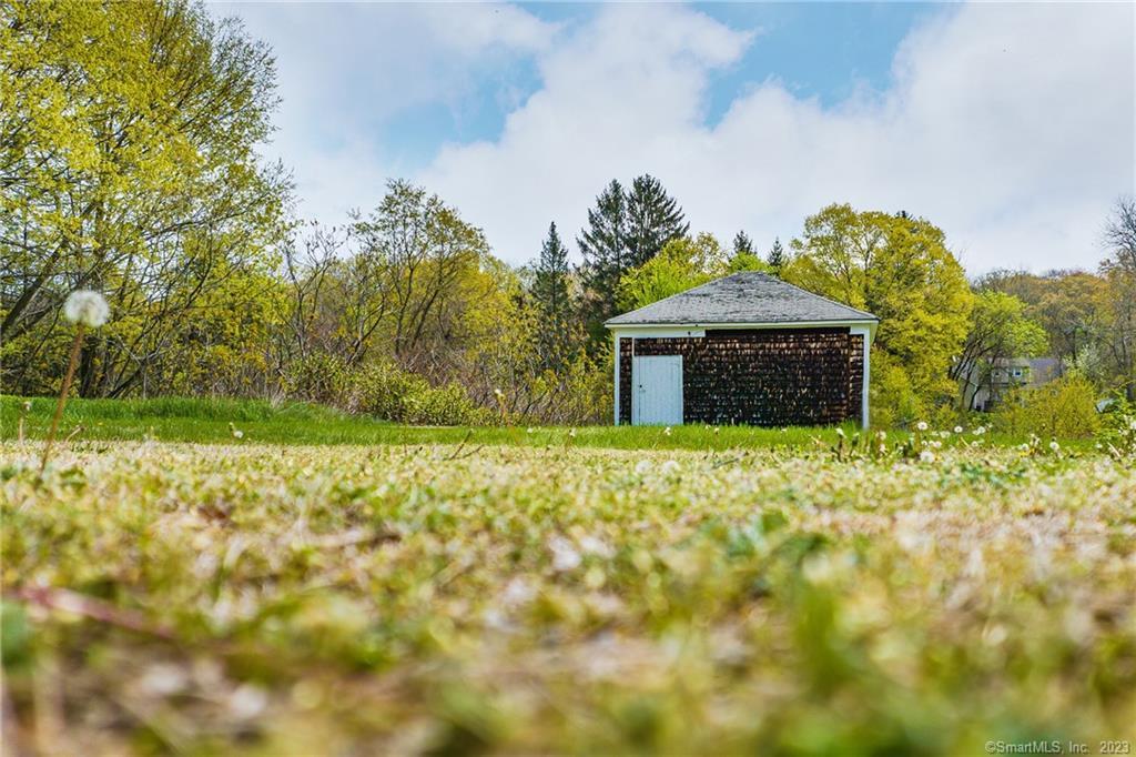 6 Broad Street Killingly, CT 06239 - Photo 8 of 13 a front view of a house with a garden
