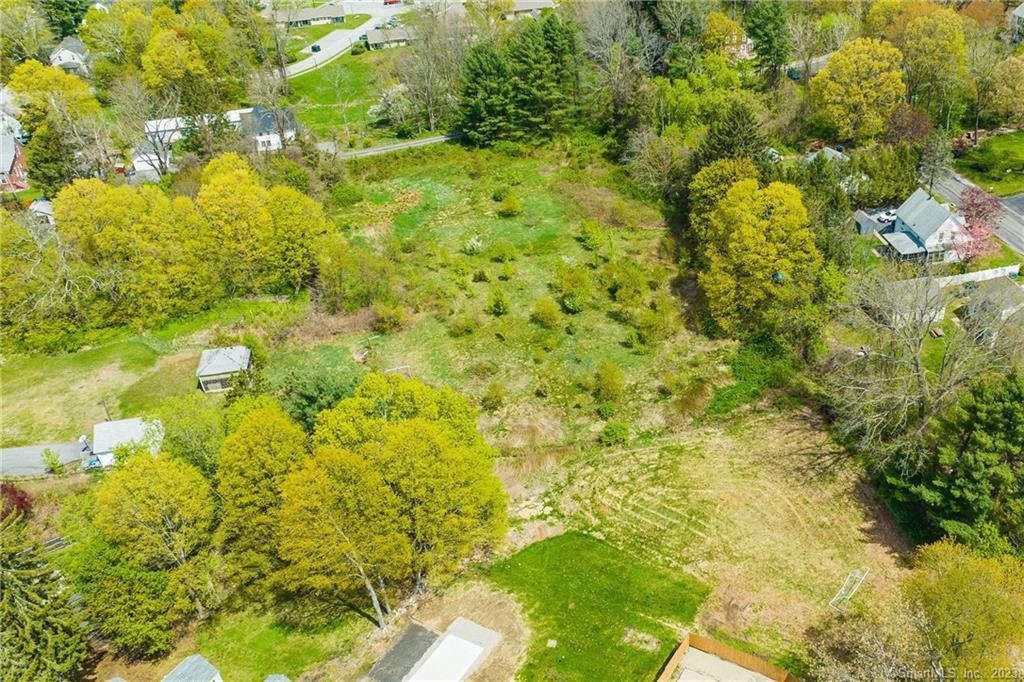 6 Broad Street Killingly, CT 06239 - Photo 9 of 13 a view of a big yard with large trees