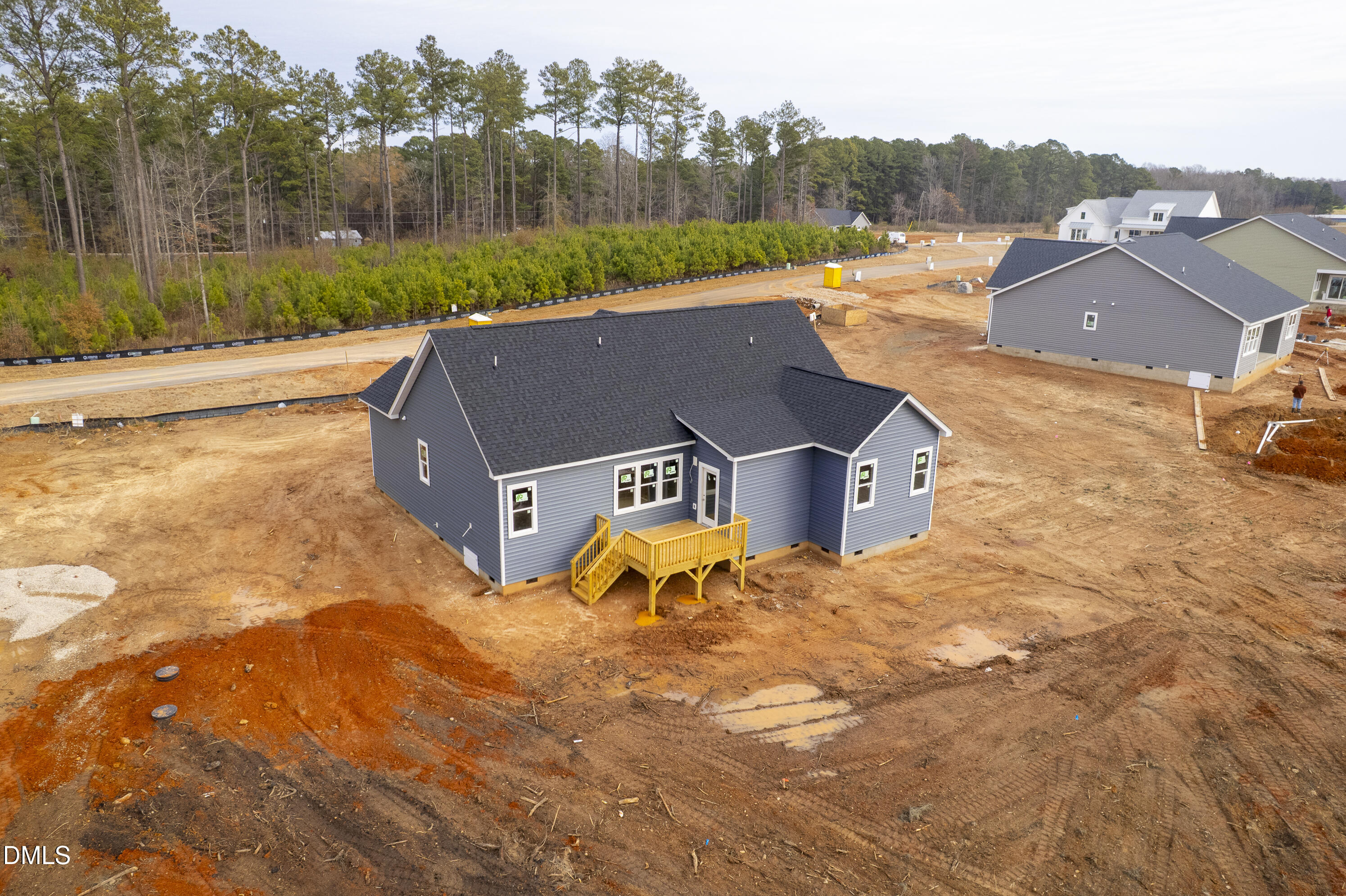 2736 River Meadow Spring Hope, NC 27882 - Photo 10 of 17 an aerial view of a house with a yard and trees
