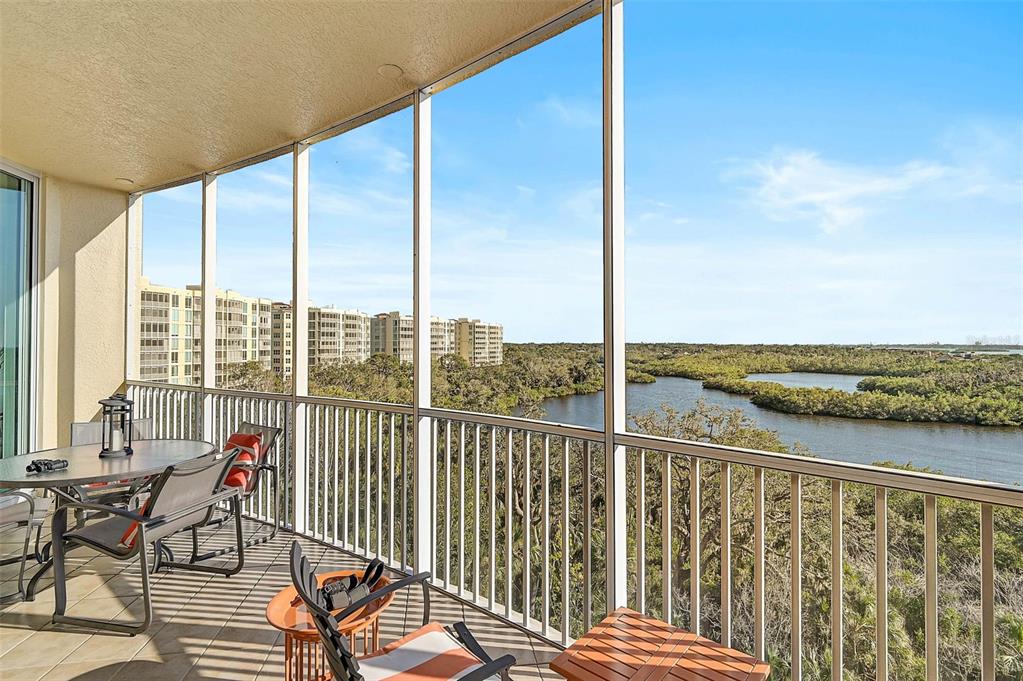 3603 North Point Road, Unit 702 Osprey, FL 34229 - Photo 15 of 61 a view of a balcony with lake view and mountain view