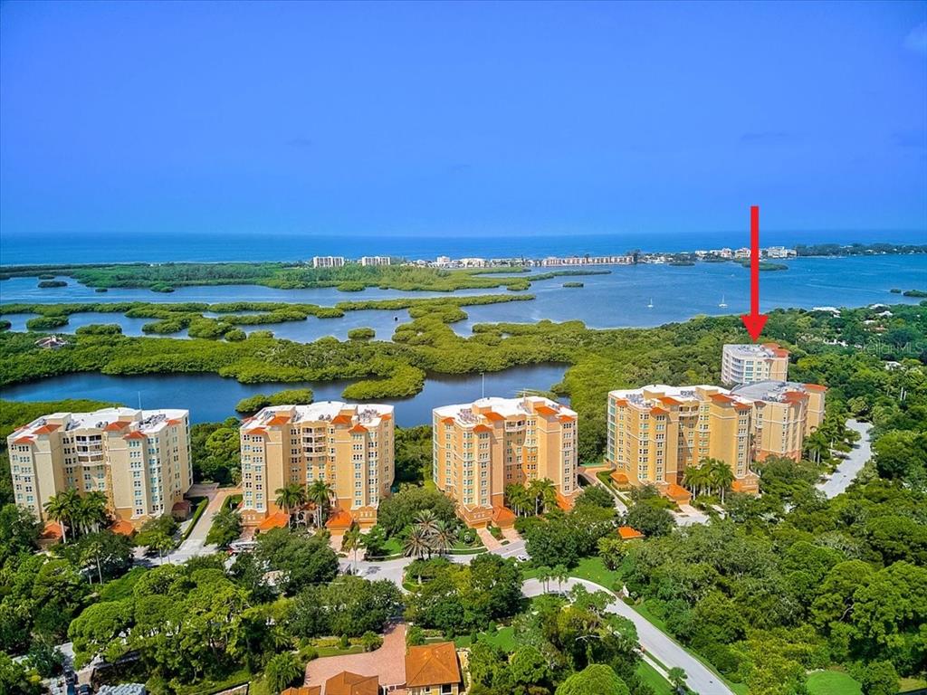 3603 North Point Road, Unit 702 Osprey, FL 34229 - Photo 31 of 61 a view of a city with a lake view