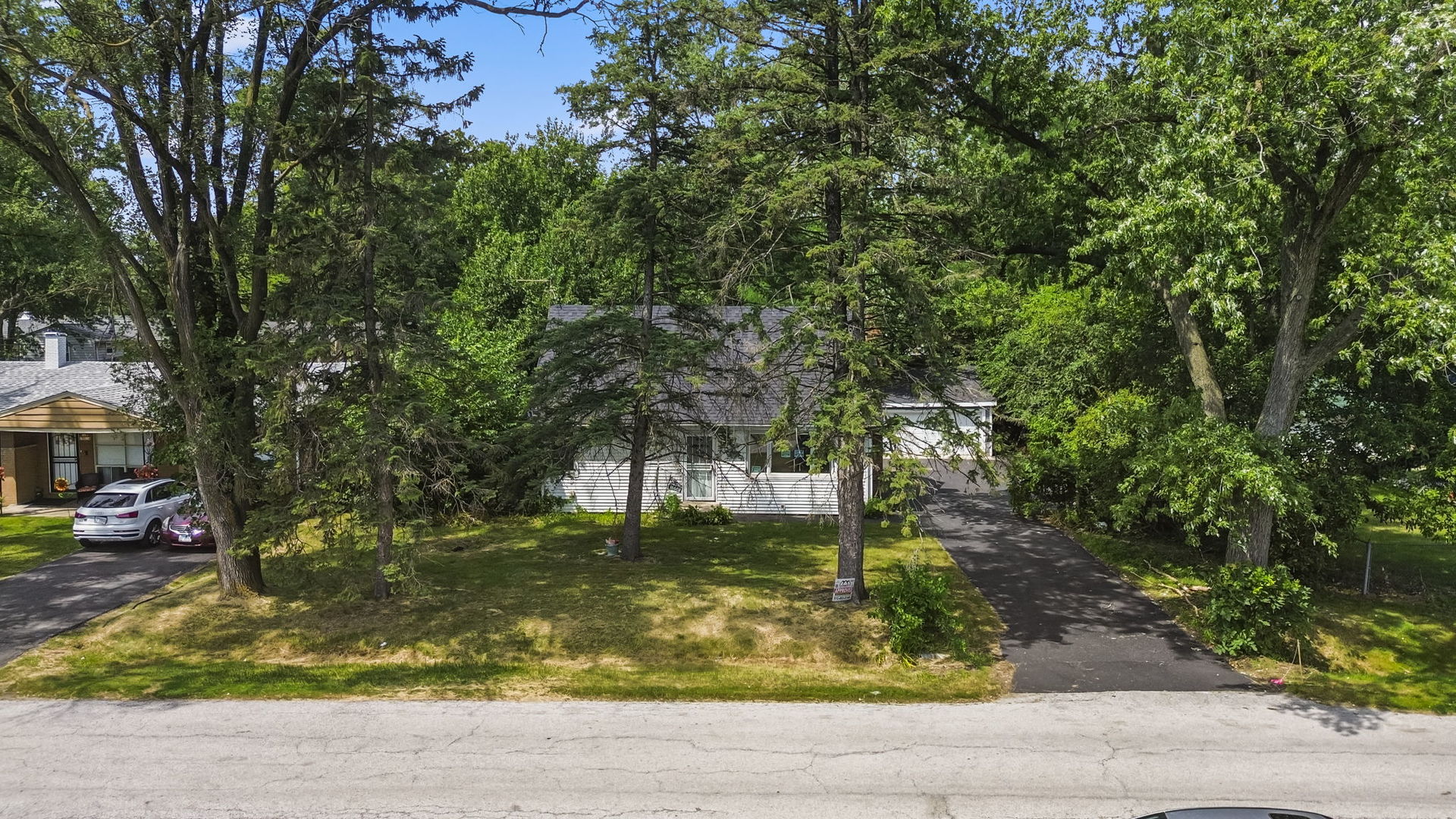 16608 Sawyer Avenue Markham, IL 60428 - Photo 2 of 19 a view of a yard with plants