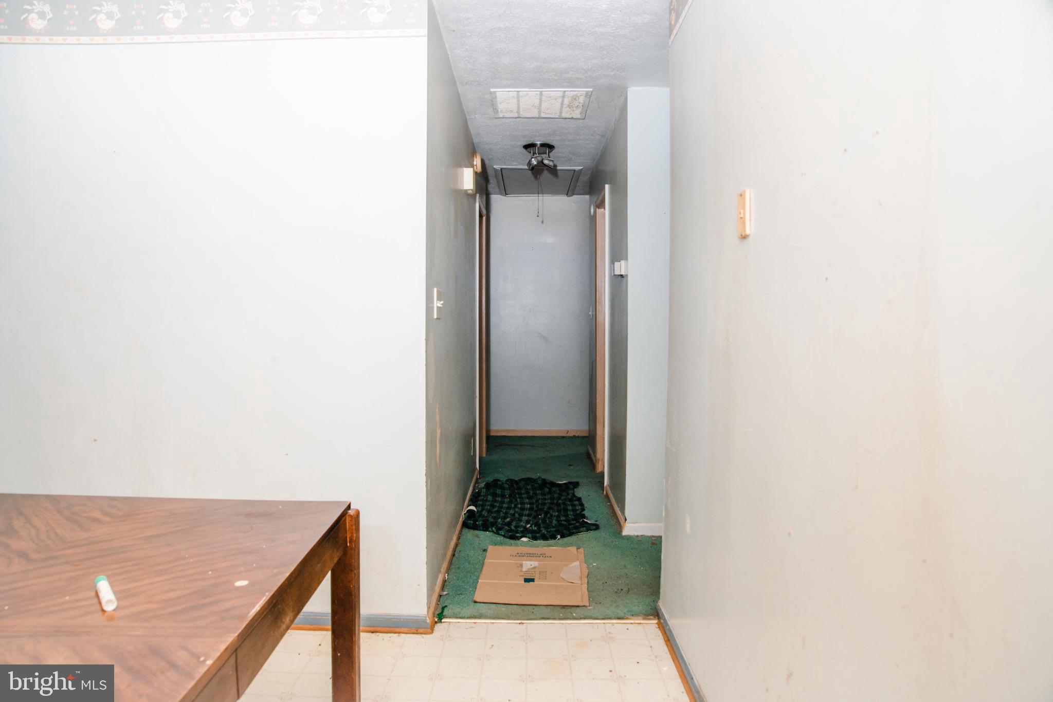 21780 Princeton Road Lexington Park, MD 20653 - Photo 6 of 18 From Kitchen to Hallway