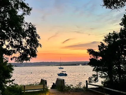 a view of a house with swimming pool and a yard