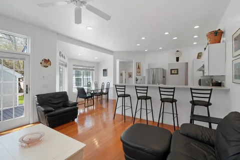 a kitchen with a sink and white cabinets