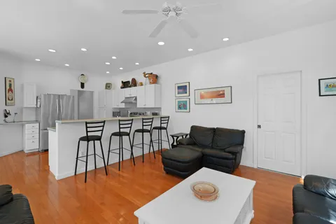 a room with toys and dresser