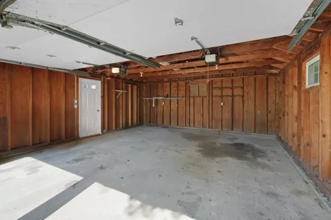 a view of an outdoor space with wooden floor