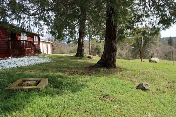 a fire hydrant in the middle of a field