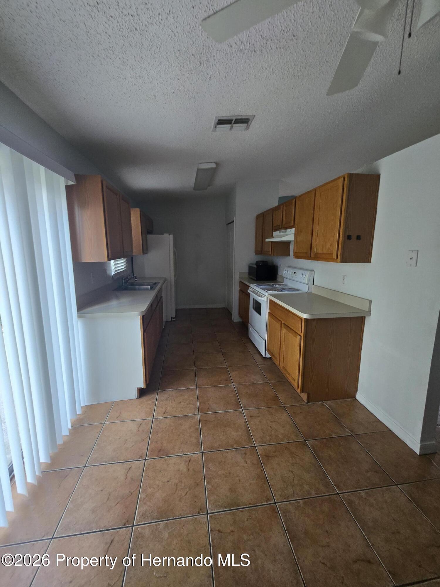 5085 Courtland Road Spring Hill, FL 34608 - Photo 4 of 13