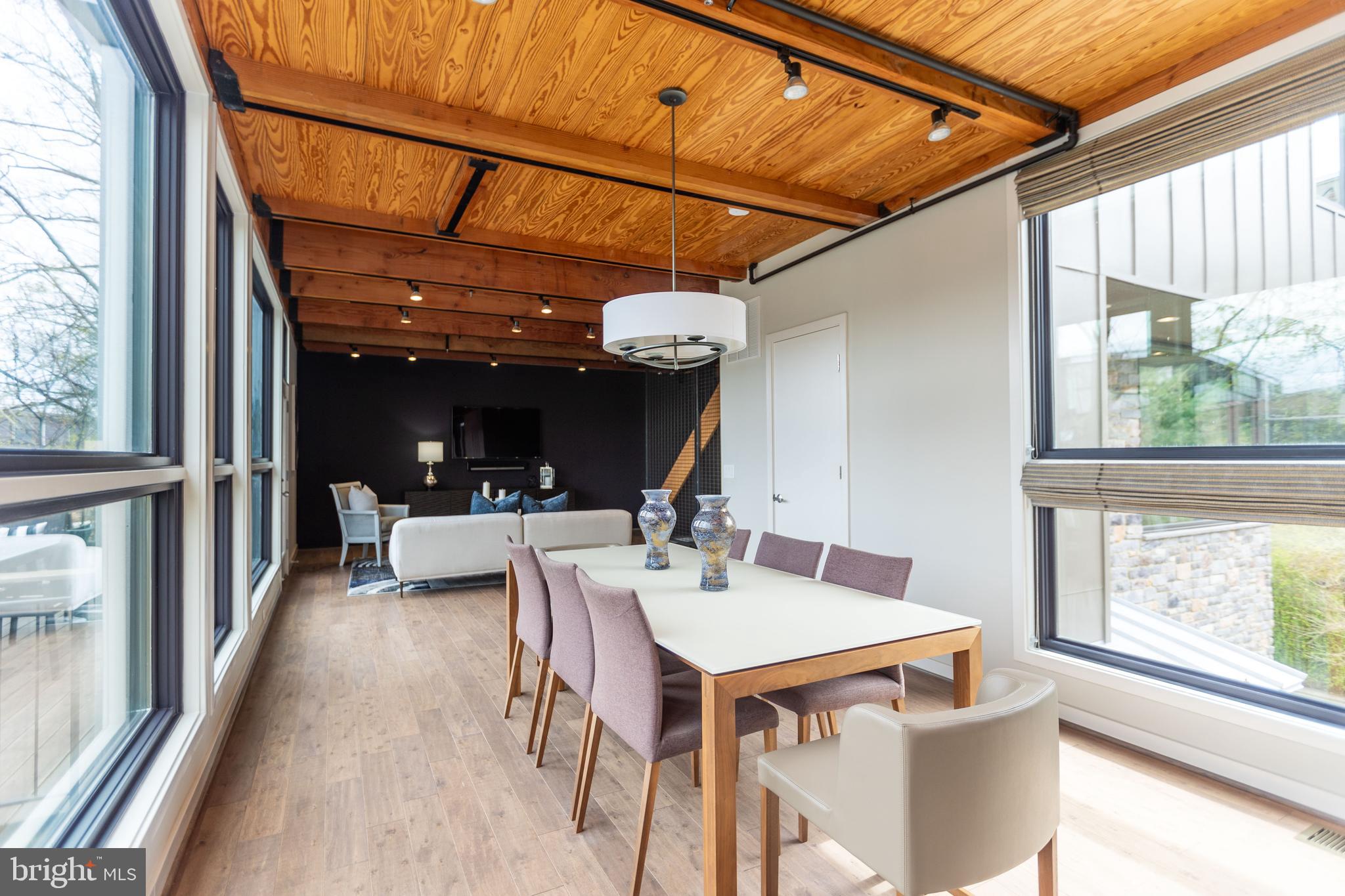 2074 Eric Shaefer Way Baltimore, MD 21211 - Photo 15 of 56 a dining room with furniture and a window