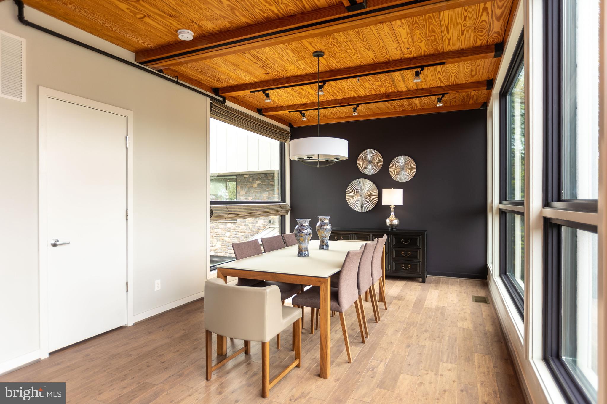 2074 Eric Shaefer Way Baltimore, MD 21211 - Photo 17 of 56 a dining room with furniture and window