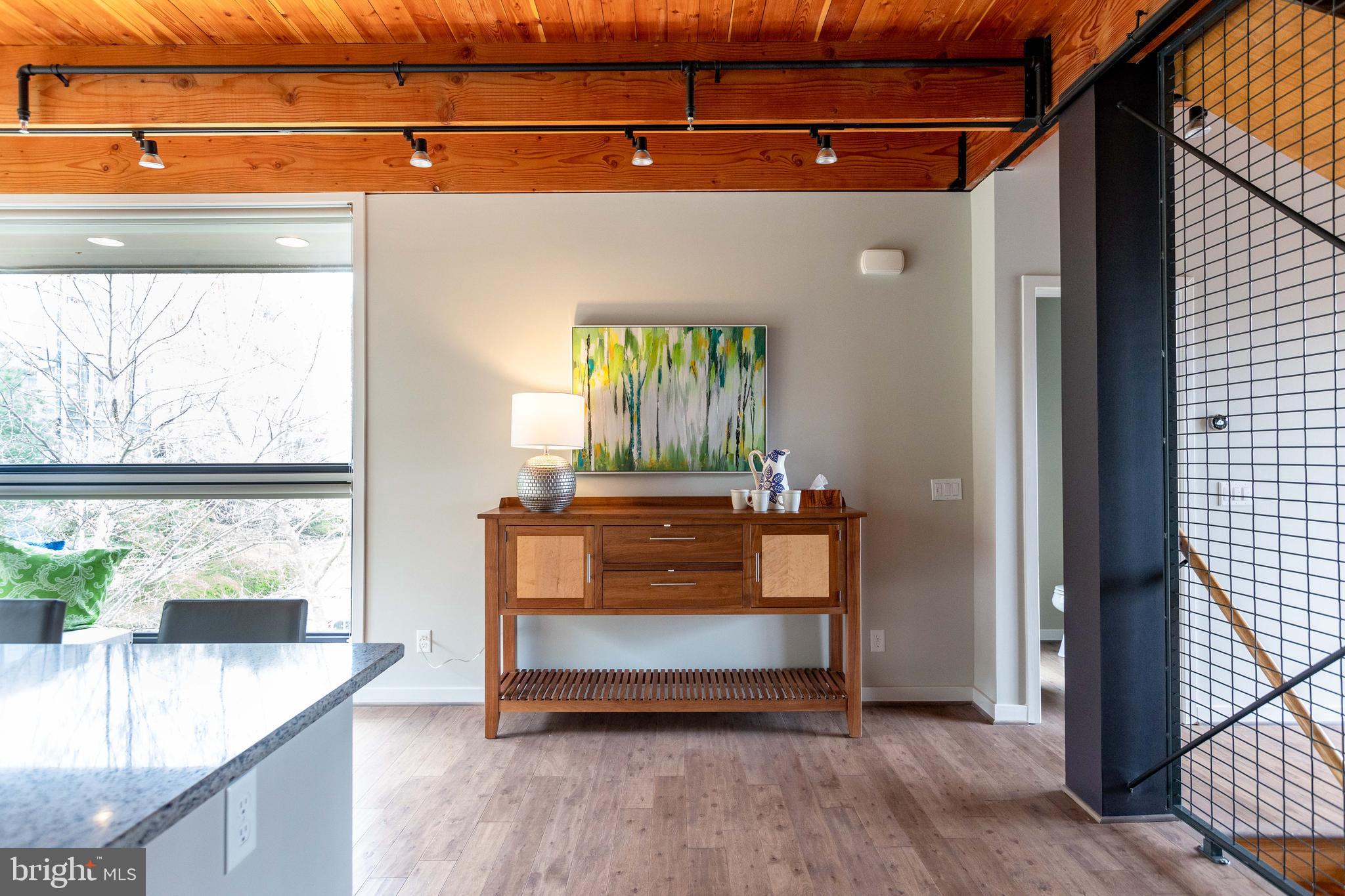 2074 Eric Shaefer Way Baltimore, MD 21211 - Photo 21 of 56 a living room with a couch and a table