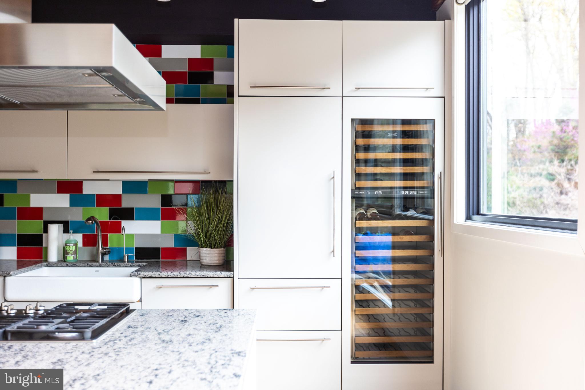 2074 Eric Shaefer Way Baltimore, MD 21211 - Photo 23 of 56 Wine fridge and refrigerator.