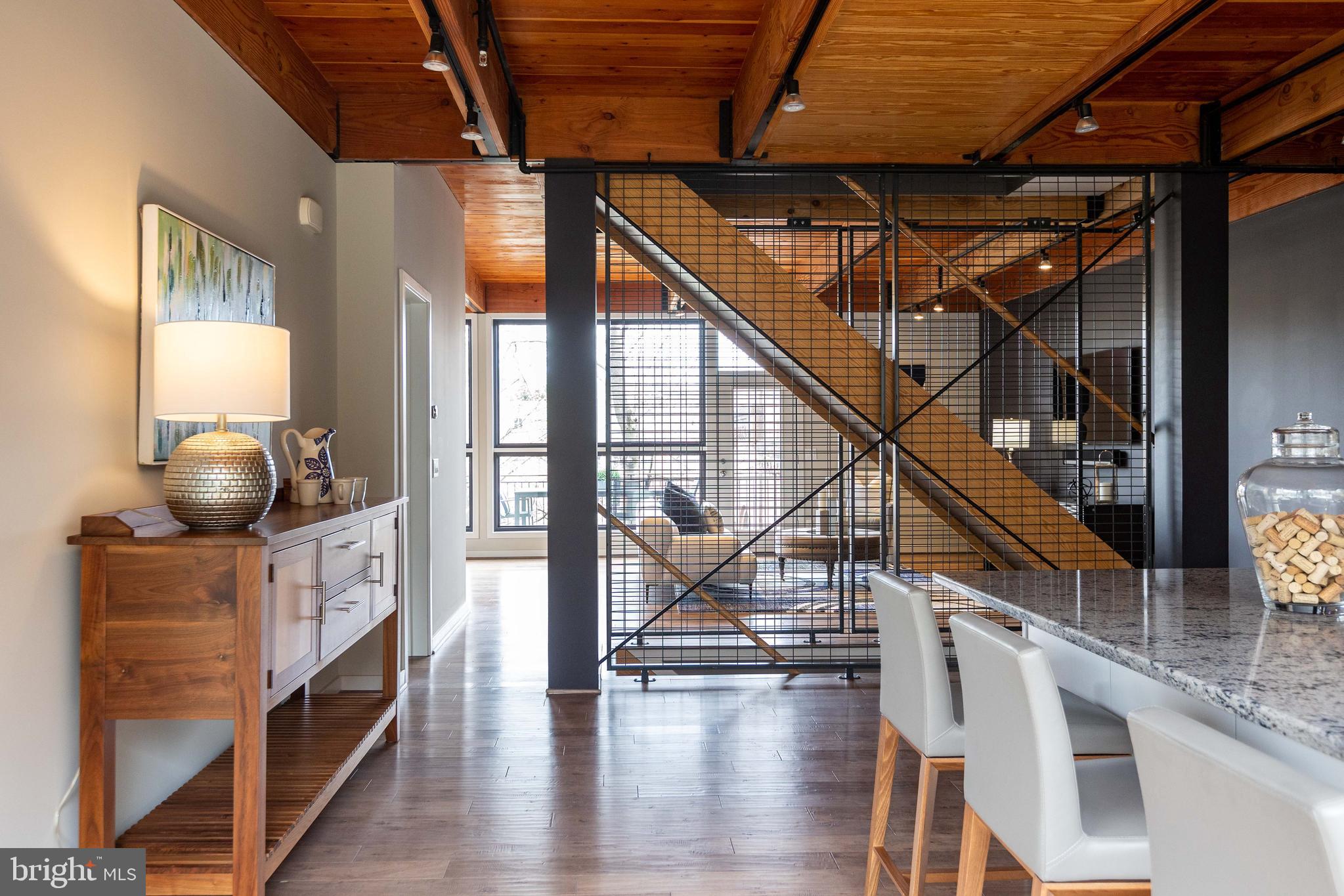 2074 Eric Shaefer Way Baltimore, MD 21211 - Photo 24 of 56 a view of entryway and hall with wooden floor
