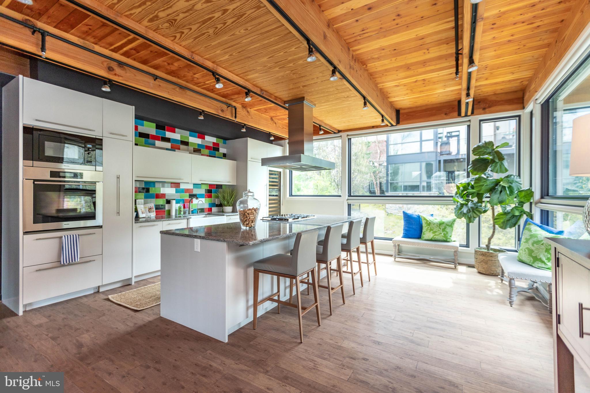 2074 Eric Shaefer Way Baltimore, MD 21211 - Photo 27 of 56 a outdoor dining space with furniture and a potted plant