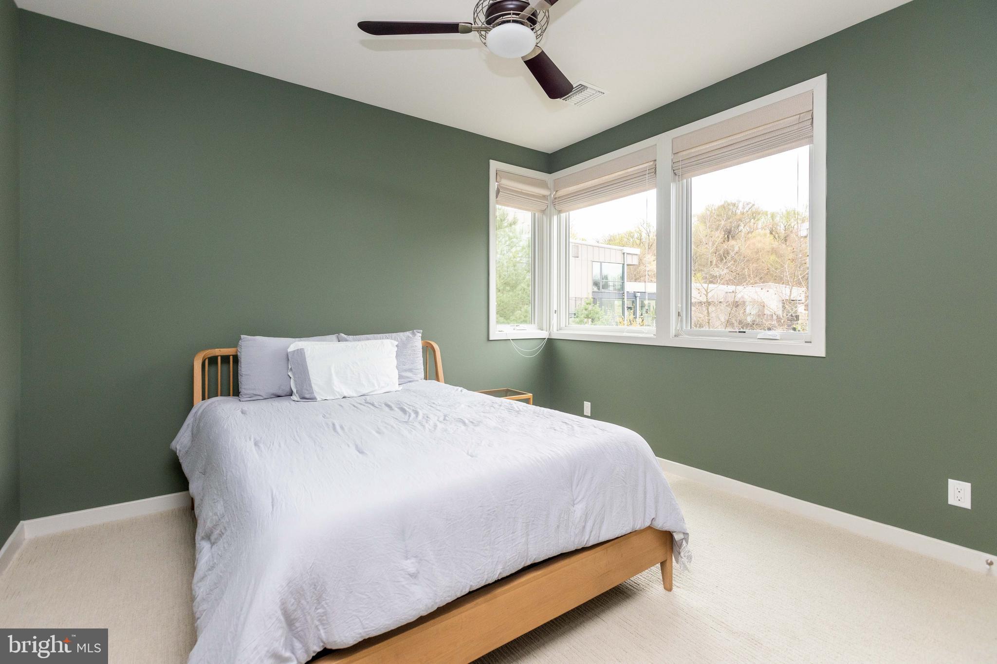 2074 Eric Shaefer Way Baltimore, MD 21211 - Photo 38 of 56 a bedroom with a bed and window