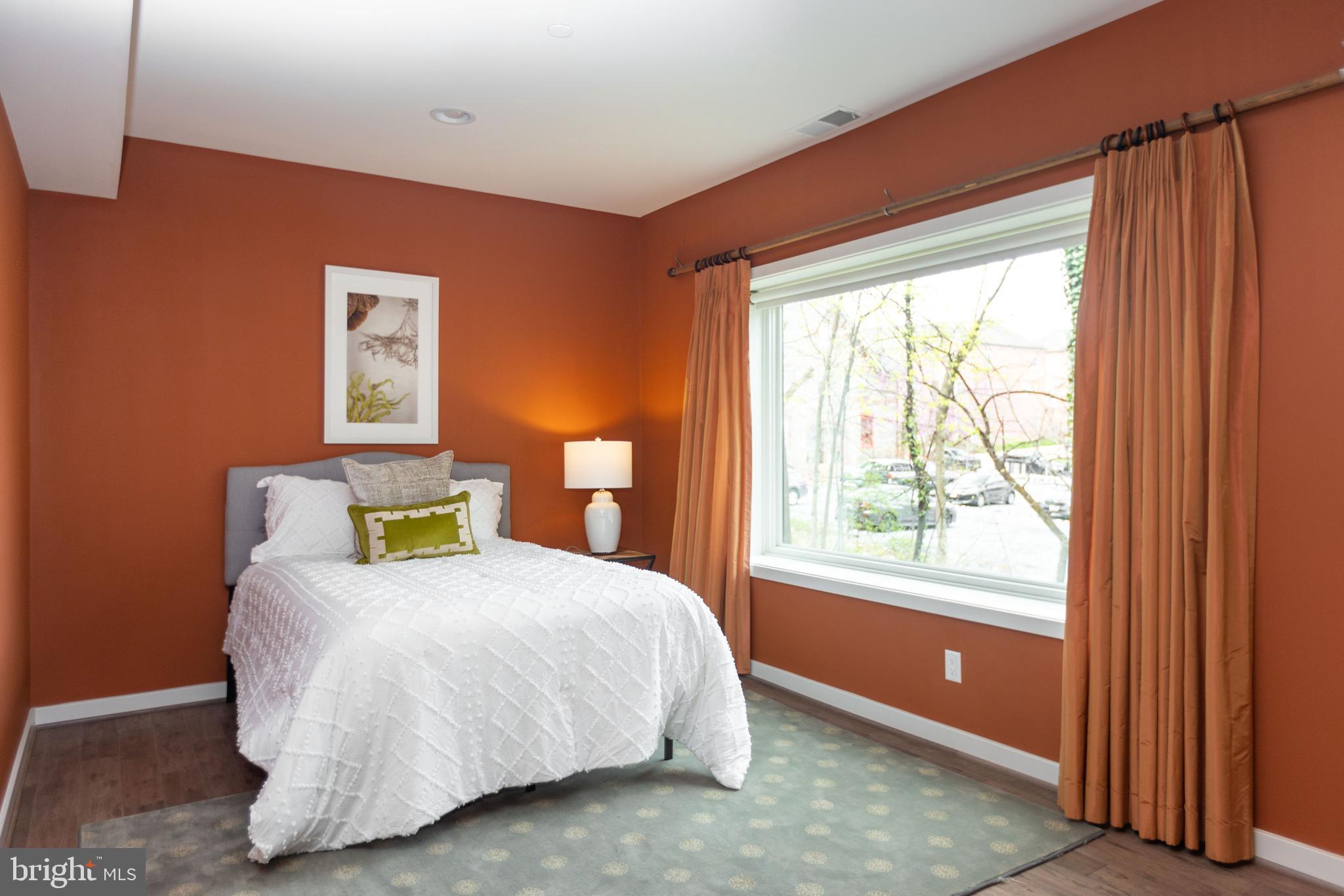 2074 Eric Shaefer Way Baltimore, MD 21211 - Photo 46 of 56 a bedroom with a bed and a window