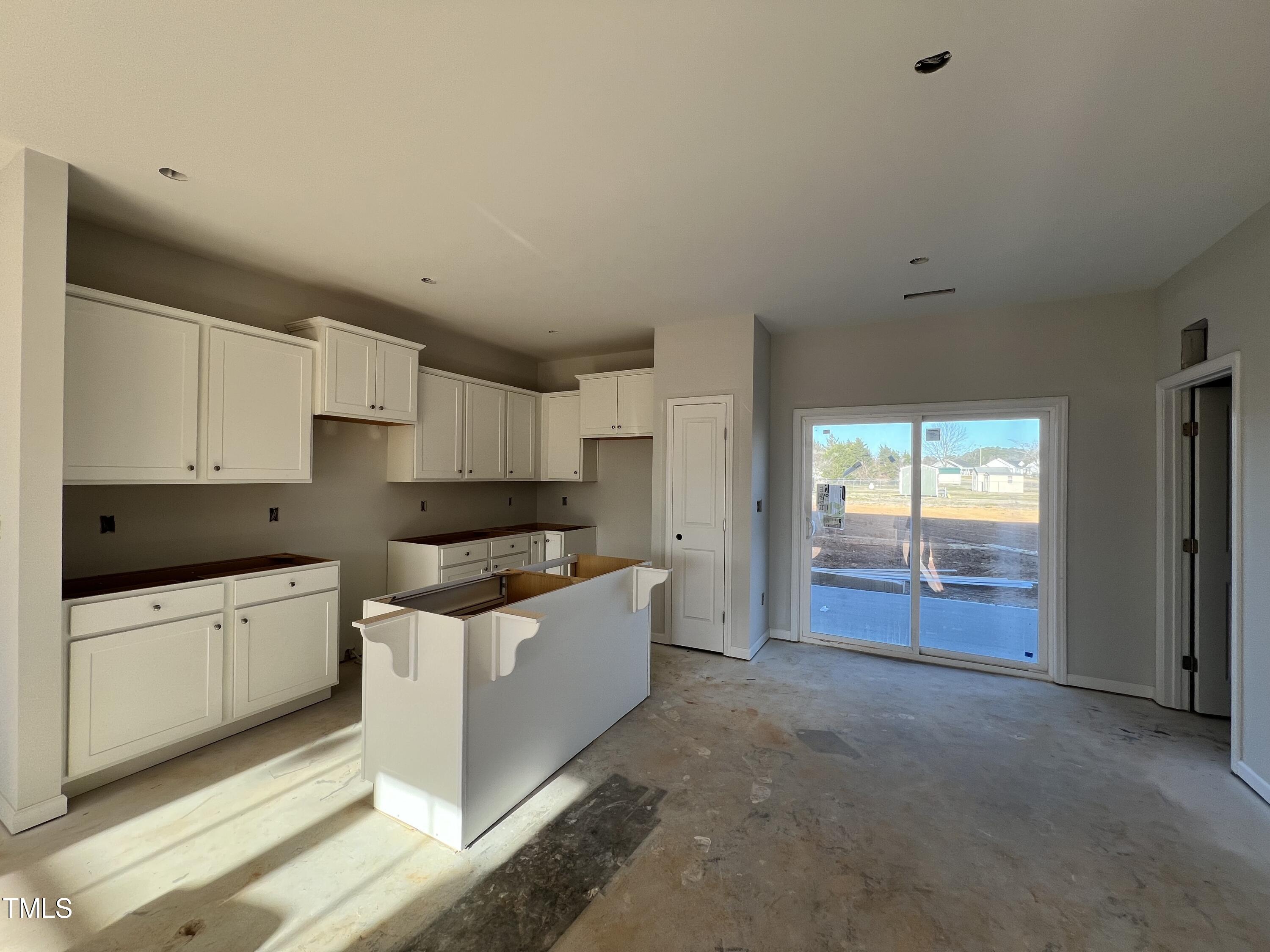 39 Longbow Drive Middlesex, NC 27557 - Photo 2 of 9 a kitchen with granite countertop a sink and a stove
