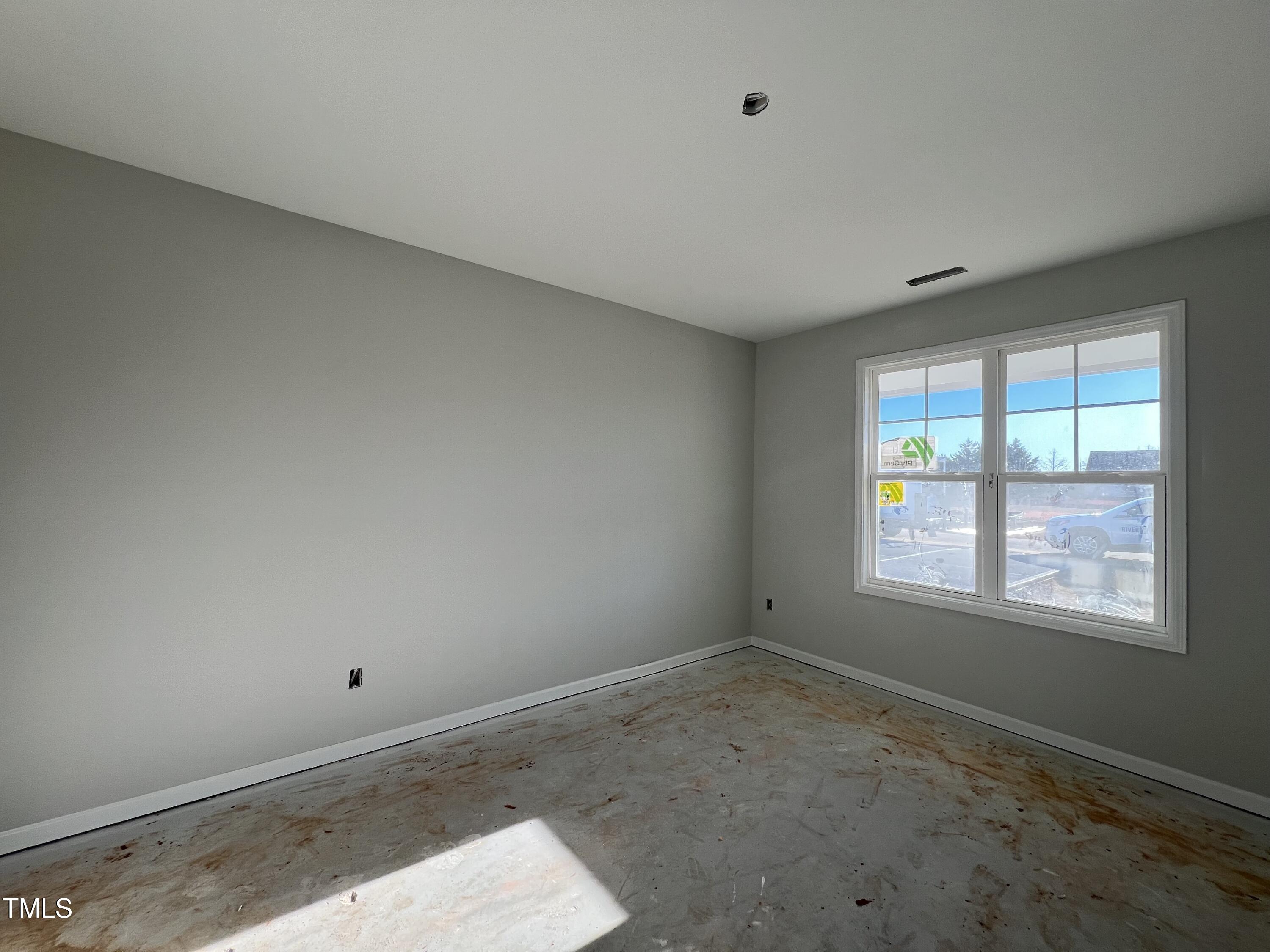 39 Longbow Drive Middlesex, NC 27557 - Photo 3 of 9 an empty room with a window