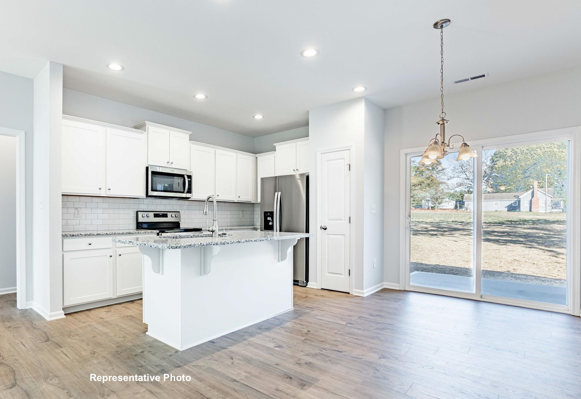 39 Longbow Drive Middlesex, NC 27557 - Photo 5 of 9 a kitchen with stainless steel appliances a refrigerator sink and microwave