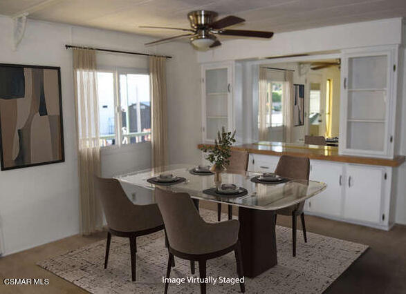 195 Tierra Rejada Road, Unit 197 Simi Valley, CA 93065 - Photo 4 of 28 a view of a dining room with furniture and window