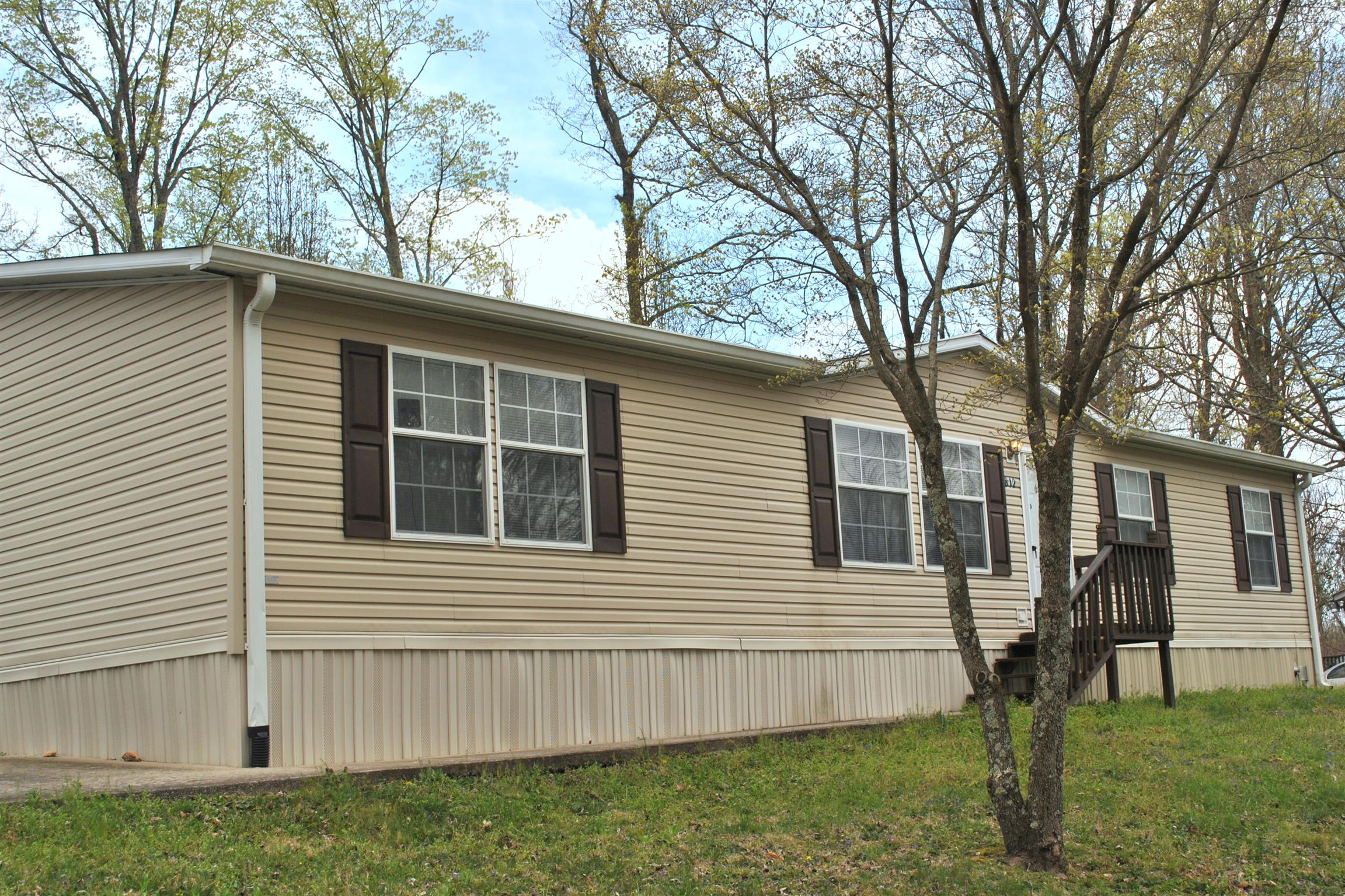 812 Dale Ridge Road Dowelltown, TN 37059 - Photo 1 of 21 a view of a house with a yard
