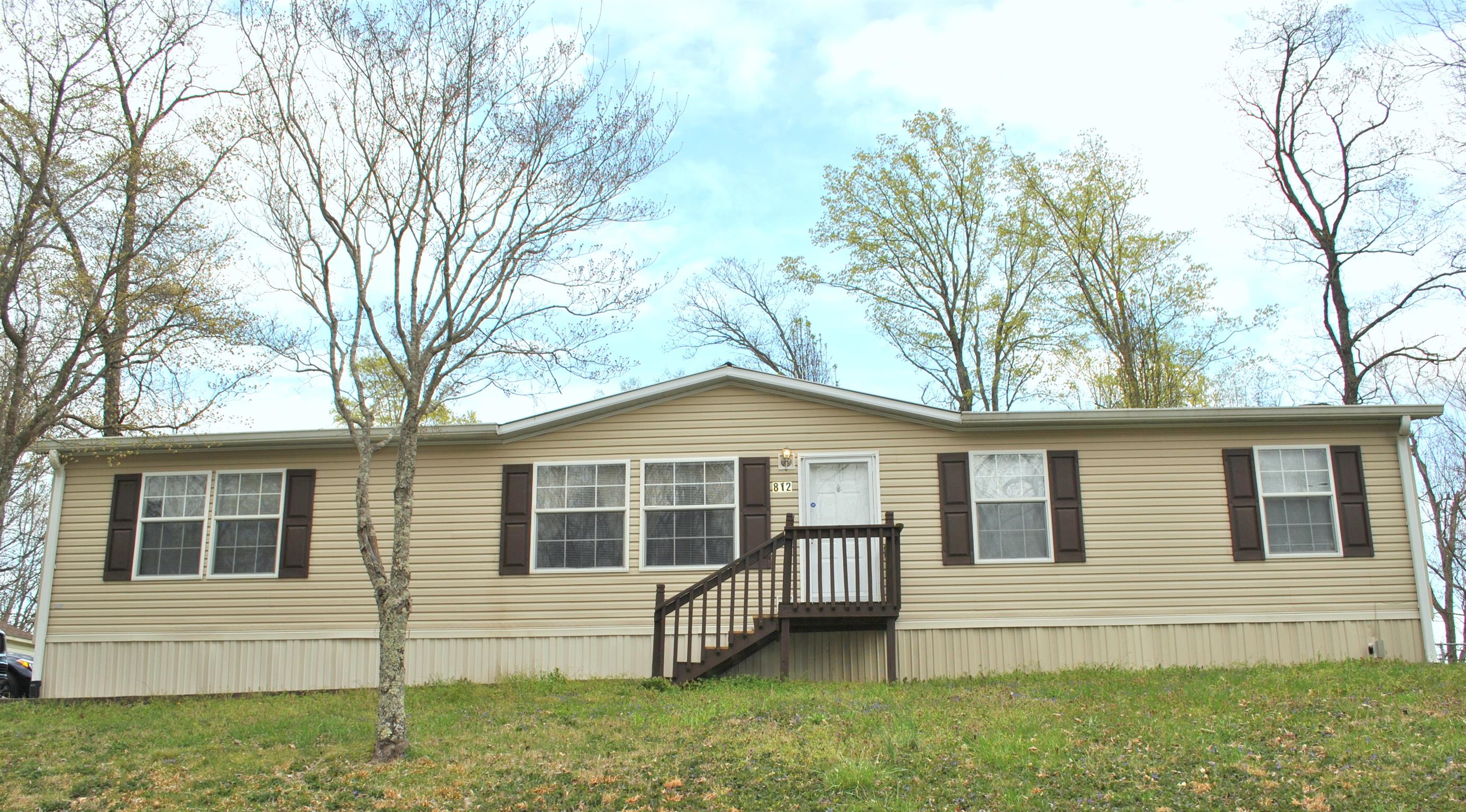 812 Dale Ridge Road Dowelltown, TN 37059 - Photo 2 of 21 a view of house with a yard