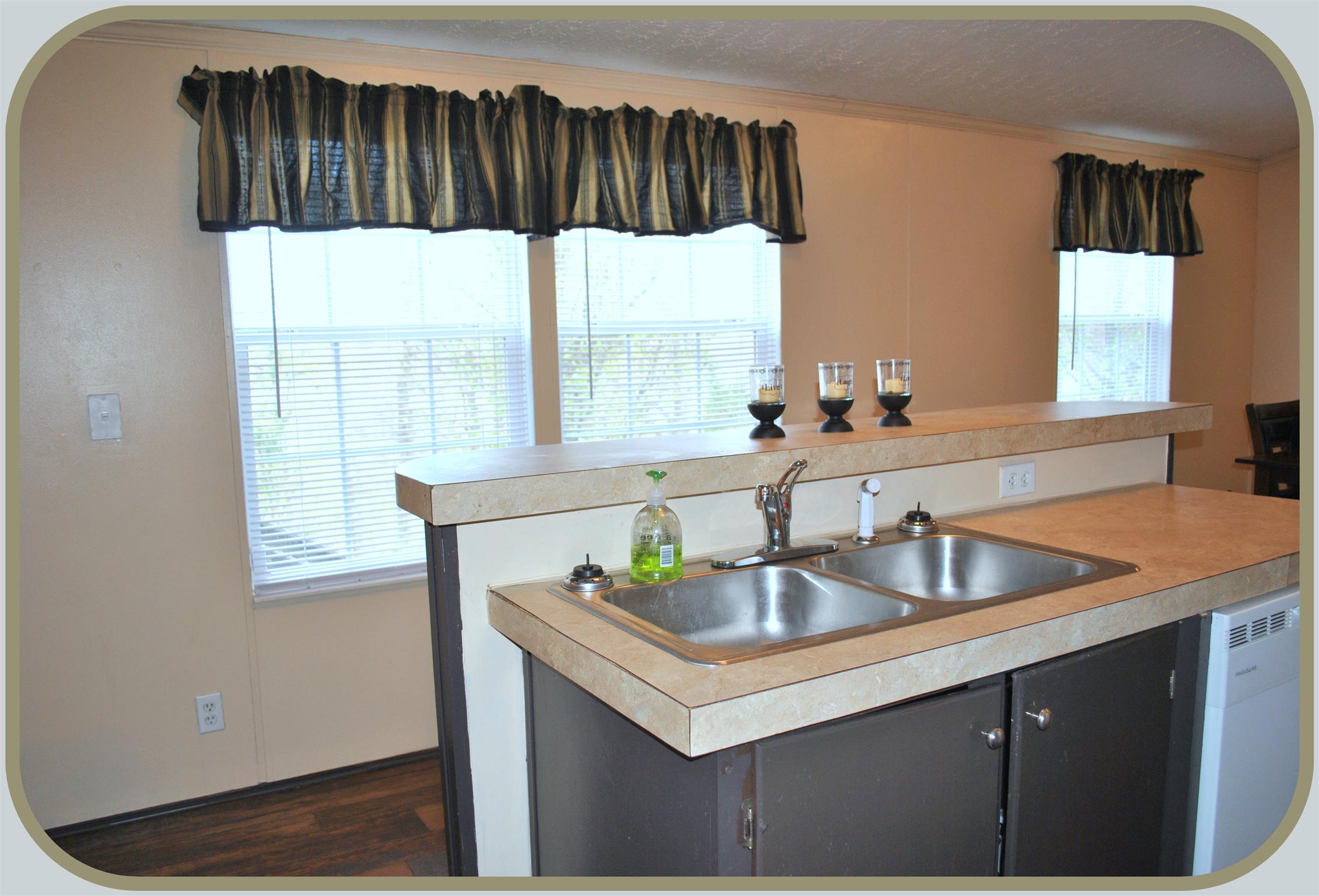 812 Dale Ridge Road Dowelltown, TN 37059 - Photo 6 of 21 a kitchen with a sink and a window