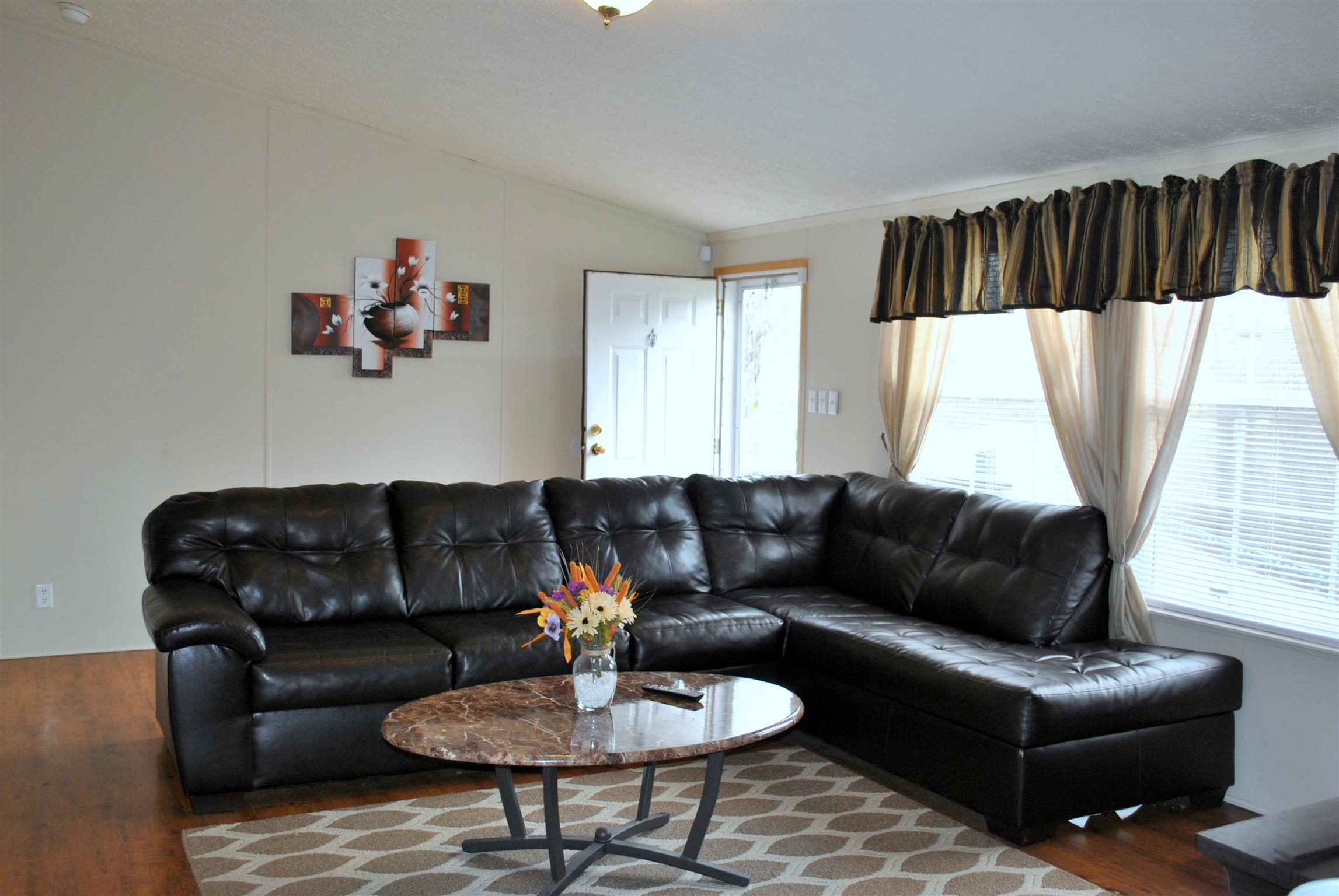 812 Dale Ridge Road Dowelltown, TN 37059 - Photo 9 of 21 a living room with furniture and a large window