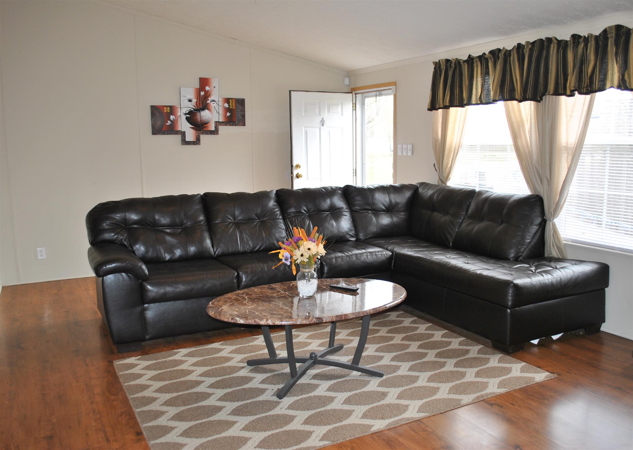 812 Dale Ridge Road Dowelltown, TN 37059 - Photo 10 of 21 a living room with furniture and a large window
