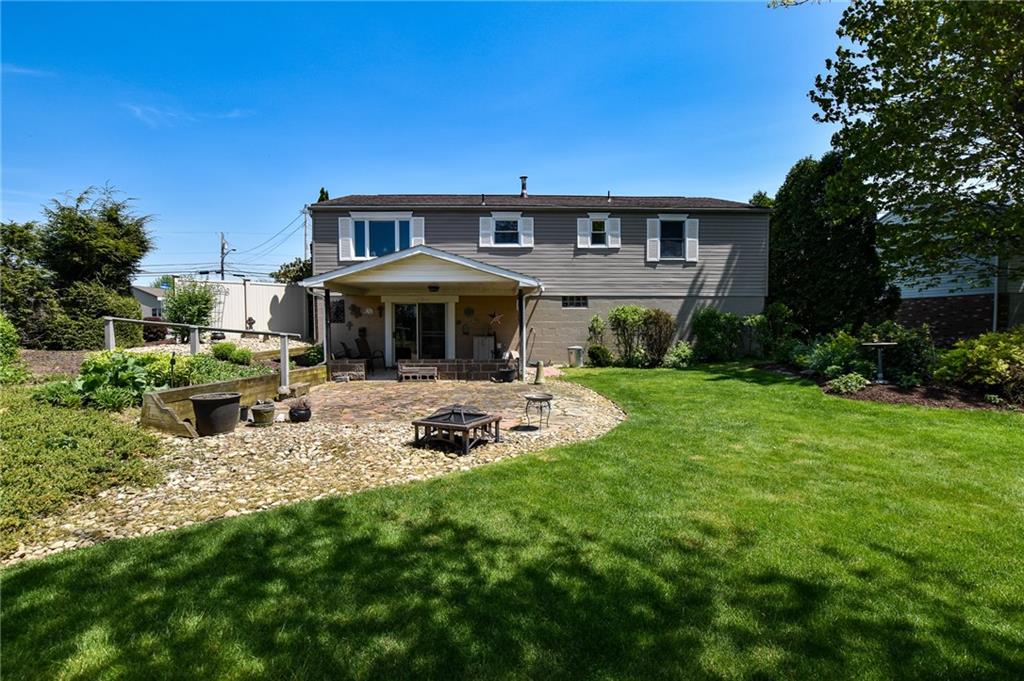 260 Fisher Road Saxonburg, PA 16056 - Photo 13 of 19 a view of a house with backyard porch and sitting area