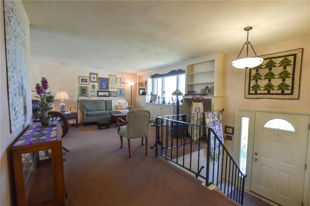 260 Fisher Road Saxonburg, PA 16056 - Photo 3 of 19 a view of a livingroom with furniture and windows