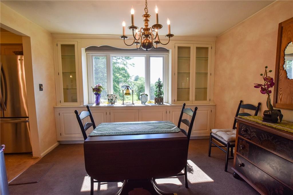 260 Fisher Road Saxonburg, PA 16056 - Photo 6 of 19 a view of a dining room with furniture window and outside view