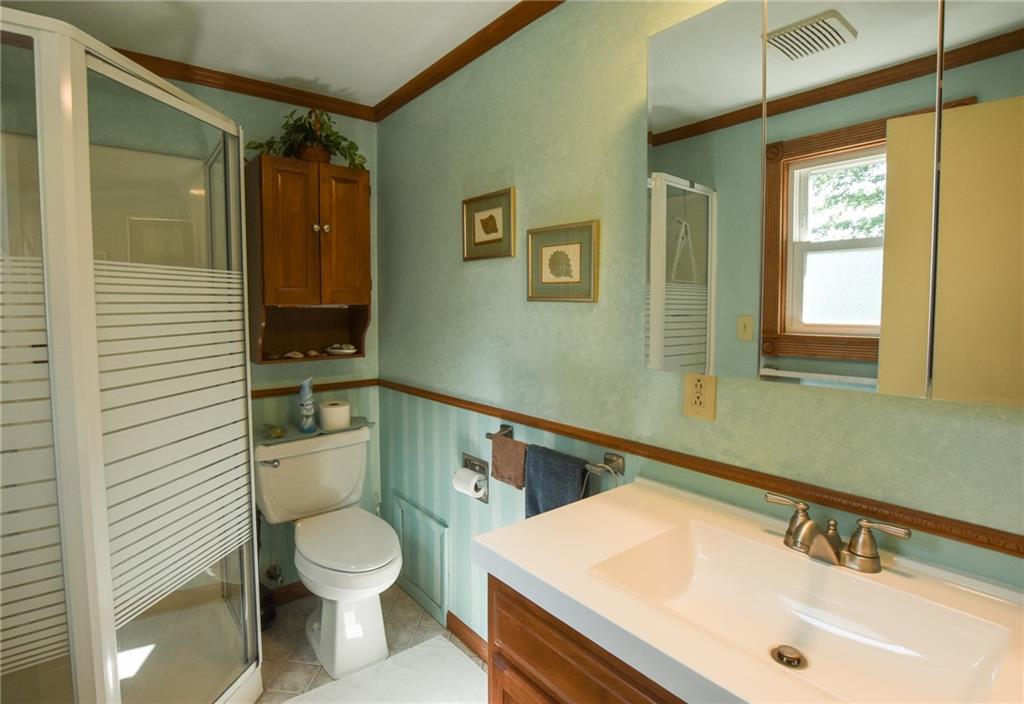 260 Fisher Road Saxonburg, PA 16056 - Photo 8 of 19 a bathroom with a sink a toilet and shower