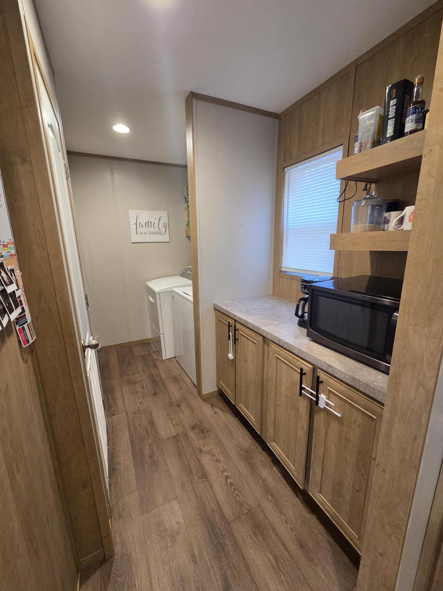 625 Jamestown Road Rocky Mount, VA 24151 - Photo 5 of 11 a kitchen with a sink and refrigerator
