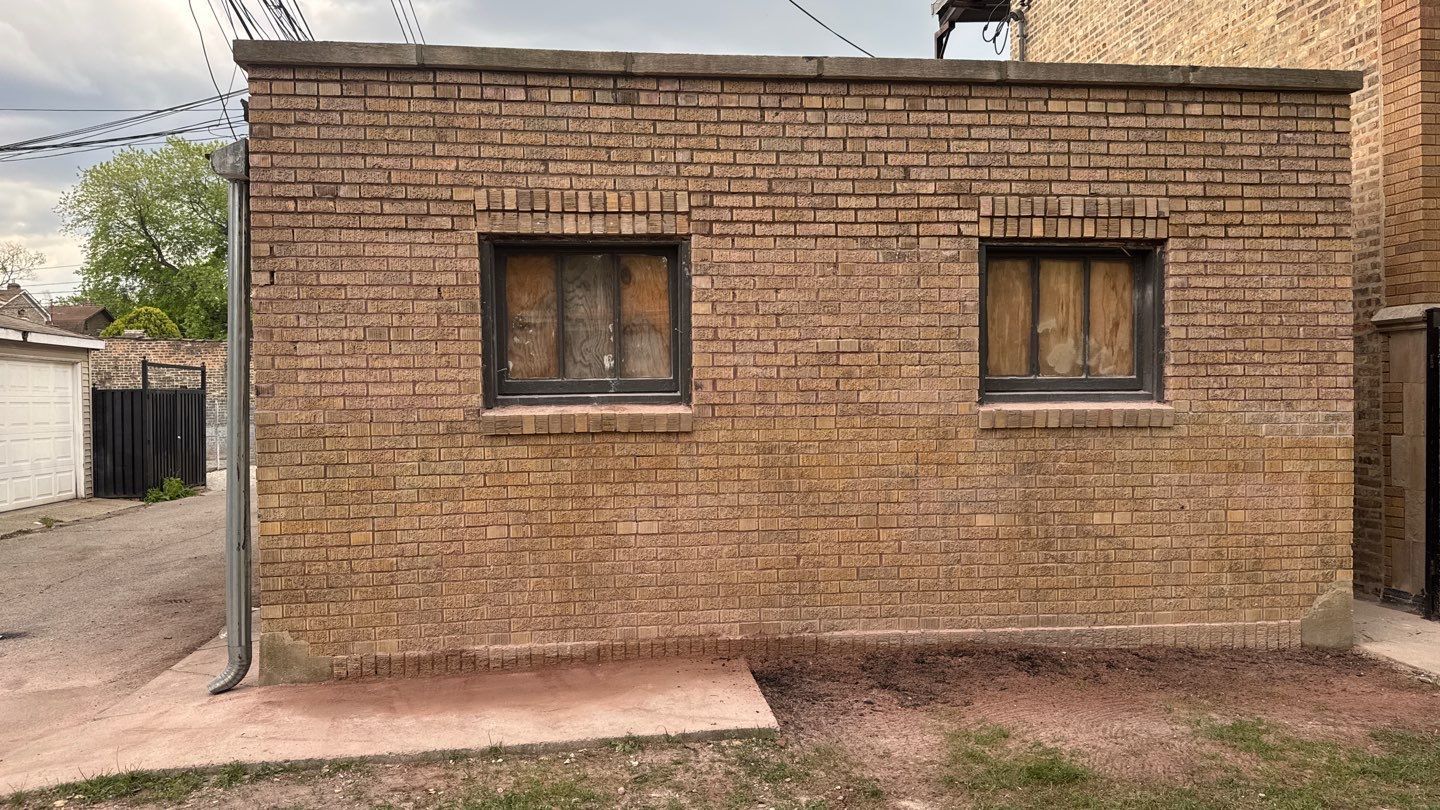 2453 West 56th Street, Unit 1N Chicago, IL 60629 - Photo 2 of 2 a front view of a house