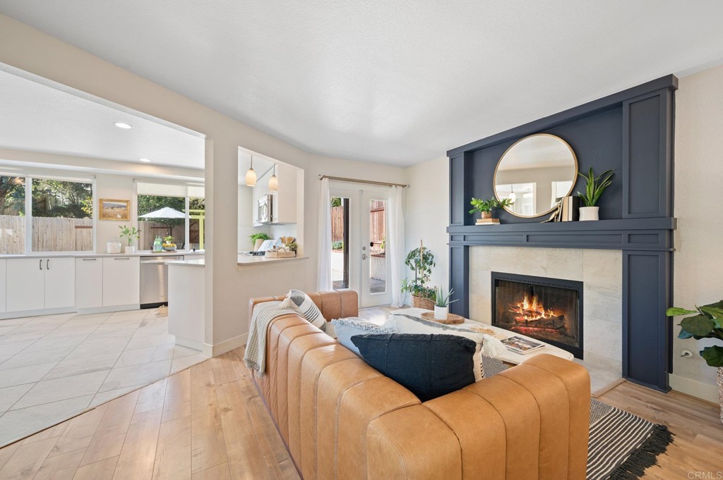 1740 Avenida Segovia Oceanside, CA 92056 - Photo 15 of 40 a living room with furniture and a fireplace