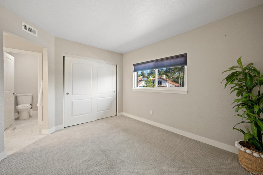 1740 Avenida Segovia Oceanside, CA 92056 - Photo 22 of 40 a view of an empty room with a window