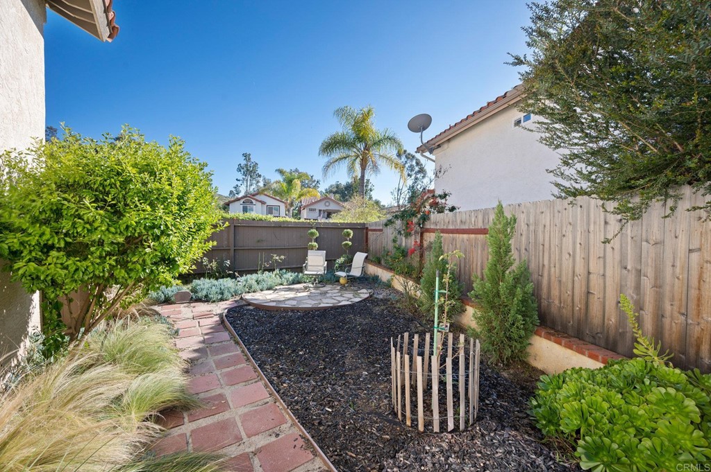 1740 Avenida Segovia Oceanside, CA 92056 - Photo 28 of 40 a view of a backyard with potted plants