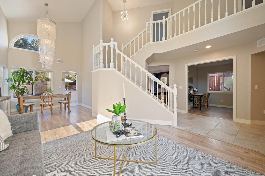 1740 Avenida Segovia Oceanside, CA 92056 - Photo 6 of 40 a living room with furniture and a wooden floor