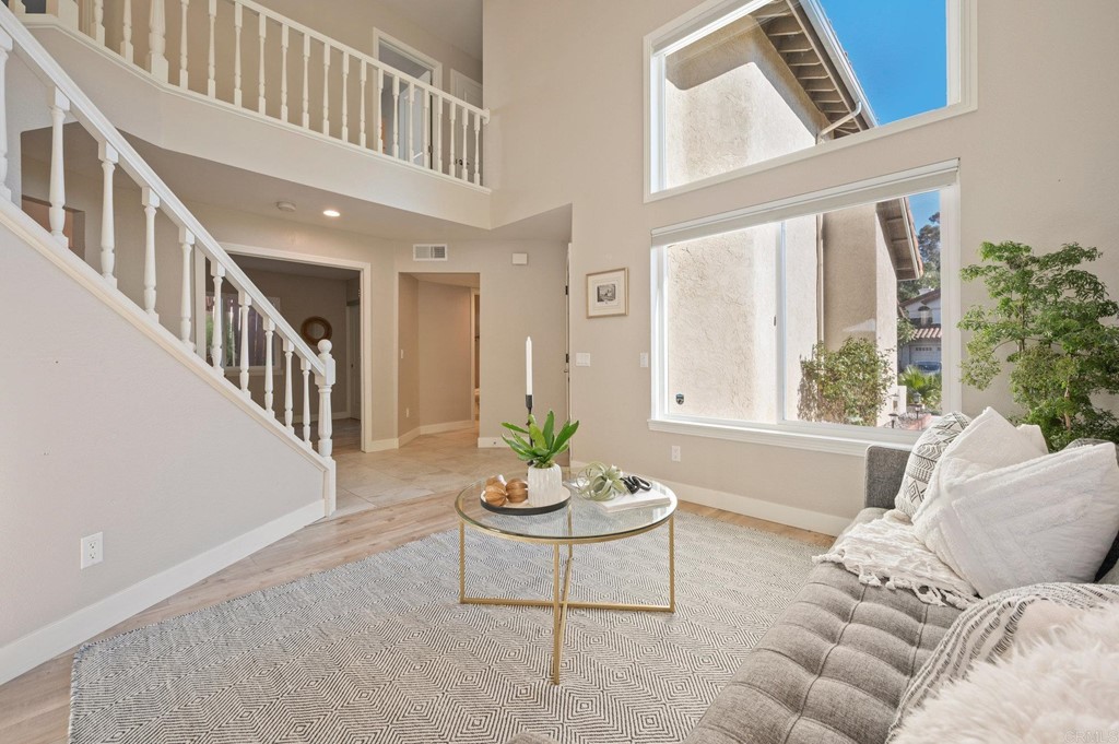 1740 Avenida Segovia Oceanside, CA 92056 - Photo 7 of 40 a living room with furniture and windows