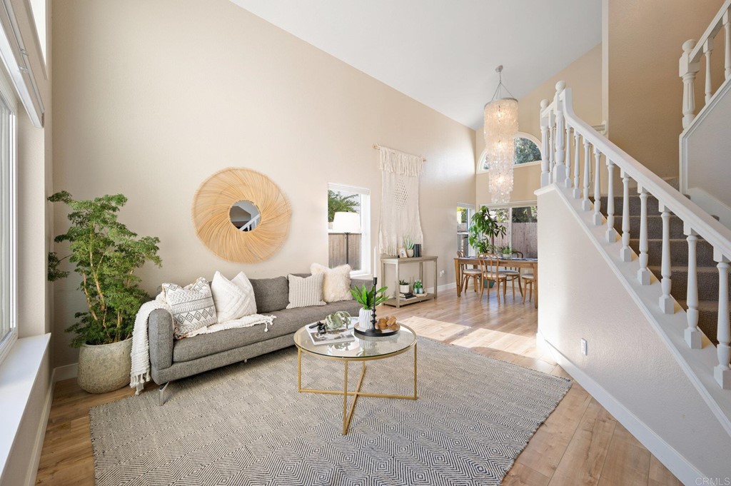 1740 Avenida Segovia Oceanside, CA 92056 - Photo 8 of 40 a living room with furniture and a large window