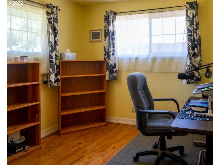 370 Lombard Lane Eugene, OR 97404 - Photo 14 of 19 a view of a workspace with furniture and a window